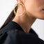 statement wired effect hoops perfect for any occasion comes in 22k gold plated jewellery and silver finish  jewellery 
